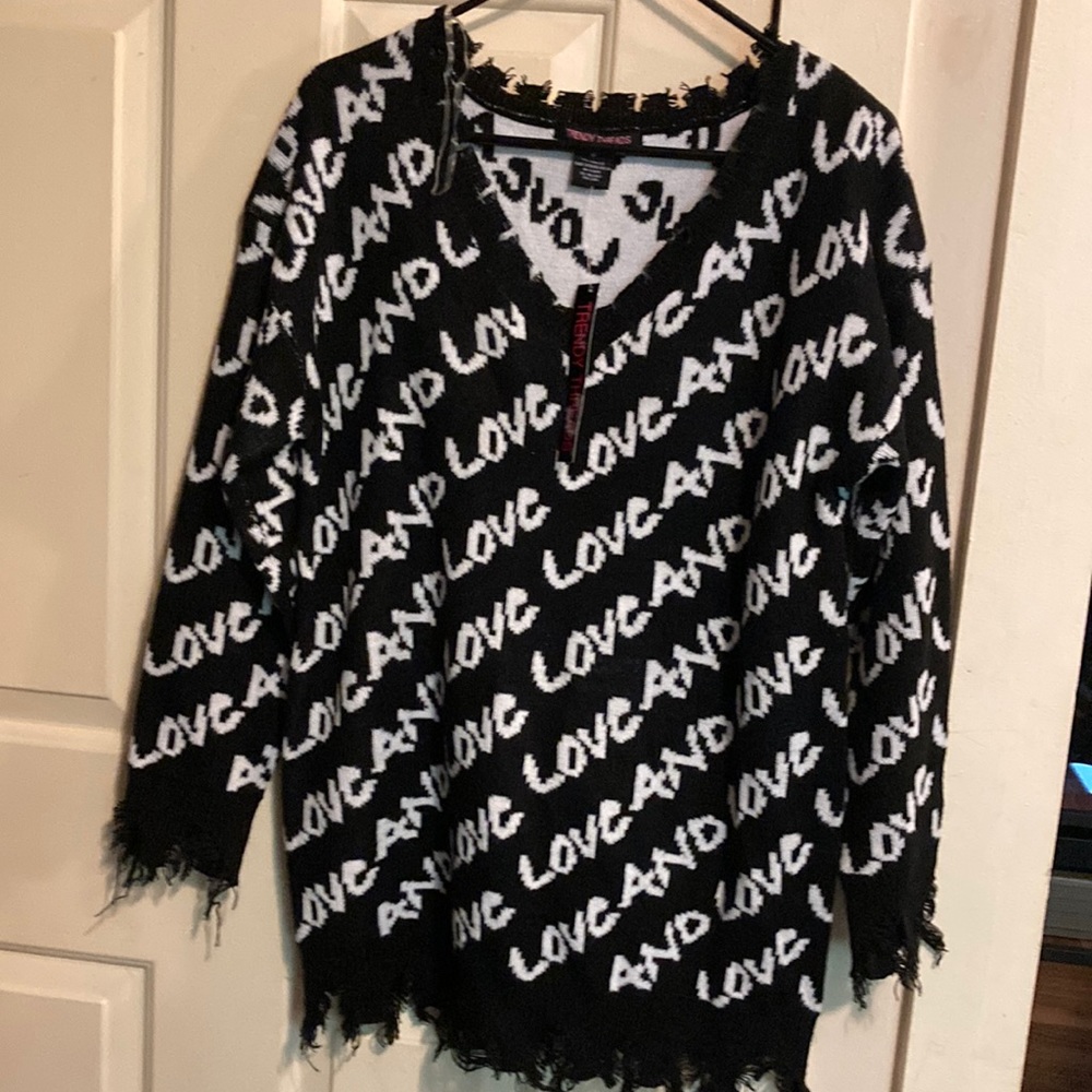 Trendy threads Love raw edges sweater size M